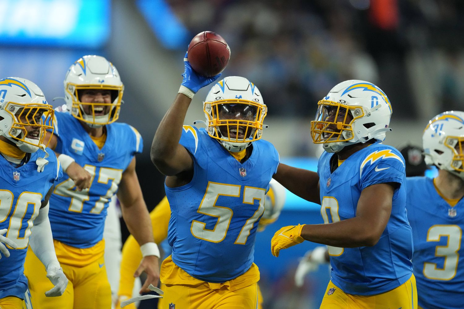 Linebackers Amen Ogbongbemiga comes up with a fumble against the Buffalo Bills.